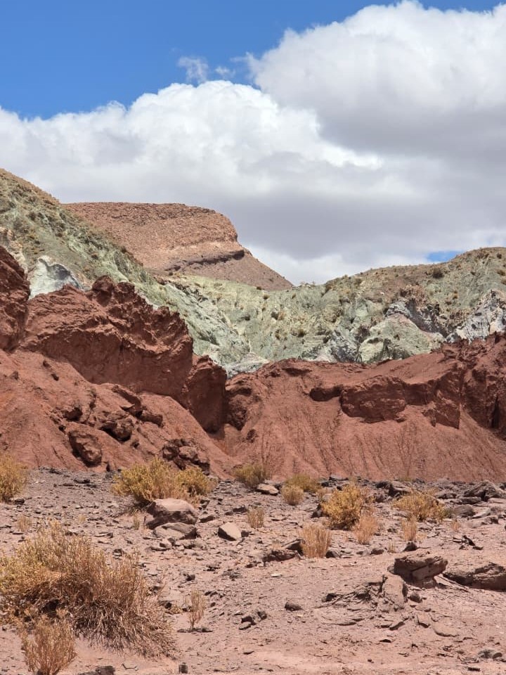Rock formations beneath a blue sky